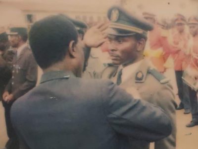 Cet officier des armées, technicien supérieur des laboratoires et analyses biomédicales, formé à Marseille en France en 1981-1982,   décédé le 13 novembre 2013 des suites de maladie à l'hôpital militaire de Région numéro 1 de Yaoundé, fût l'un de nombreux militaires des forces de défense camerounaise loyalistes durant le putsch manqué du vendredi 06 avril 1984 à Yaoundé, jamais révélé au grand public. 